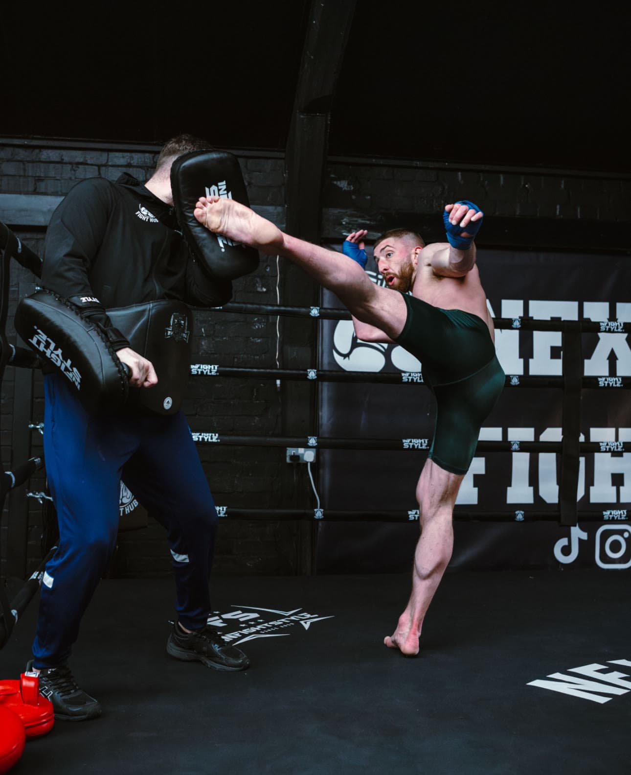 Pad work in the ring under the Next Gen banners