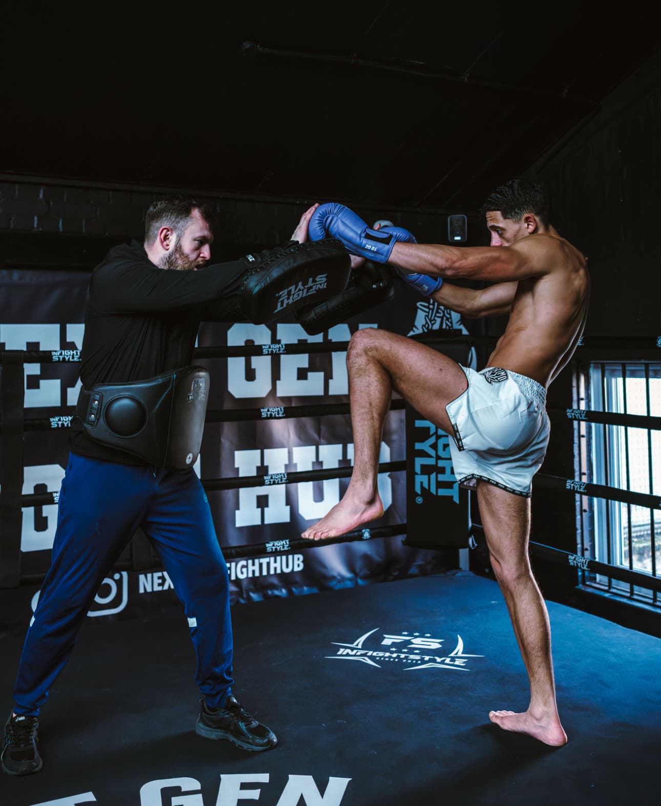 Pad work in the ring at Next Gen Fight Hub